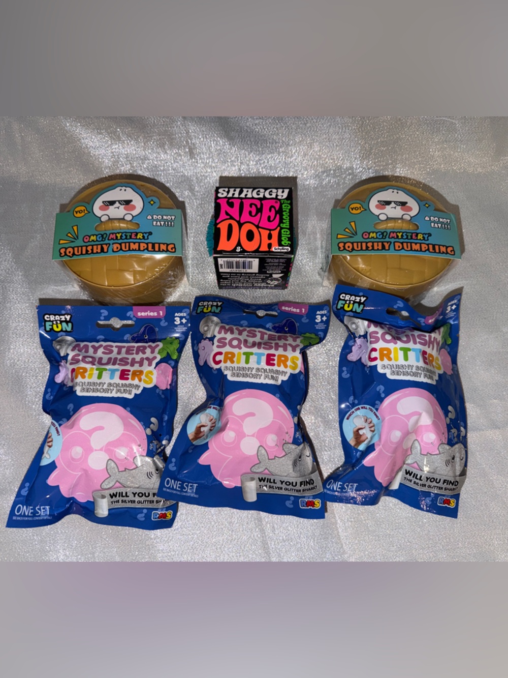 (1) NeeDoh Shaggy, (2) OMG Mystery Dumplings & (3) Mystery Squishy Critters